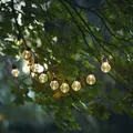 Produktbild: LED Solar Lichterkette 10 klare Kugeln mit warmweißer LED Lichtsensor Garten