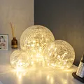 Produktbild: Lights4fun 3er Set Glaskugeln mit Lichterkette | warmweiße LEDs | batteriebetrieben | Leuchtkugel Herbst Winter | Kugelleuchte Fensterbank Glaskugel Fensterdeko | für innen