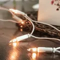 Produktbild: Lichterkette innen 50 klare warme Lichter, beleuchtet 7,35m, Kabel weiß, Stecker