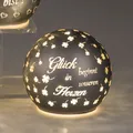 Produktbild: LED Kugellampe mit Glück beginnt ... Spruch D. 10cm grau mit Timer Formano