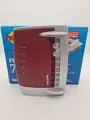 Produktbild: AVM FRITZ!Box 7490 Wireless Router/DSL-Modem - Rot (20002584) Inkl OVP