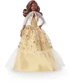 Produktbild: Barbie Signature - 2023 Holiday Puppe 35. Jubiläumsedition mit goldenem Kleid und dunkelbraunes Haar, Echtheitszertifikat, saisonales Sammlergeschenk für Kinder ab 6 Jahren, HJX05