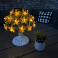 Produktbild: LED Tischleuchte Solar kabellos mit 31 Hibiskusblüten gelb - Outdoor Dekolampe