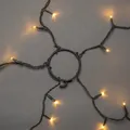 Produktbild: Konstsmide - LED Baummantel mit Ring, für Weihnachtsbaum, 5 Stränge à 40 Dioden , vormontiert, 200 bernsteinfarbene Dioden, 24V Innentrafo, dunkelgrünes Kabel; 6361-820