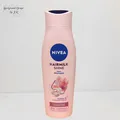 Produktbild: 250ml Nivea Hairmilk Shine Haarmilch Natürlicher Glanz Shampoo Mandelöl