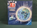Produktbild: Ravensburger 3D Nachtlicht Erde bei Nacht Verpackung beschädigt