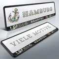 Produktbild: 2 Kennzeichenhalter | HAMBURG 13 | Anker | Moin Hansestadt | HH | DHL-Versand