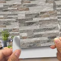 Produktbild: Hiser 20 Stück Küchenrückwand Fliesenaufkleber, Kunstleder 3D Steinimitat Backstein-Stil Wasserdicht Ölfest Stickerfliesen Deko Selbstklebende für Küche Badezimmer Wohnzimmer Dekoration (LA019,20cm)