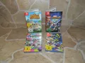 Produktbild: 4x Nintendo Switch Spiele - Animal Crossing + Super Heroes 2 + Splatoon 2 + 3