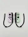 Produktbild: Nintendo Switch Joy Con Set Pastell Lila Pastell Grün Refurbished Gut Versand