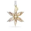 Produktbild: Swarovski Annual Edition 3D Ornament 2025, Goldfarbener Kristallstern mit 393 Facetten, Champagner-goldfarbenem Metallkern und Weißem Ripsband, Größe: 6.1 x 4.6 x 4.6 cm