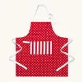Produktbild: Homescapes Rote Küchenschürze ‚Polka Dots‘ aus 100% Baumwolle, verstellbare Schürze mit Tasche, rot-weiße Kochschürze waschbar