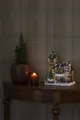 Produktbild: KONSTSMIDE Weihnachtsfigur Weihnachtsdeko (1 St), LED Fiberoptikhaus m. Burgszene + rotierendem Weihnachtsbaum, m. Musik