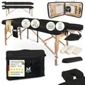 Produktbild: MASSUNDA – Mobile Comfort Deluxe Massageliege klappbar & höhenverstellbar – EXTRA breiter Massagetisch aus Vollholz – Massagebank mit ergonomischer Kopfstütze, Bezug, Armlehne, Kissen (Schwarz)