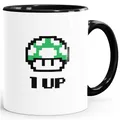 Produktbild: Kaffee-Tasse Geburtstag Retro Pixel-Pilz 1-Up-Pilz Level-Up Gaming Konsole 90er MoonWorks® schwarz unisize