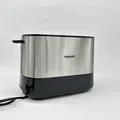 Produktbild: Philips Toaster – 2 Schlitze, 7 Einstellungen, Aufwärmen von Gebäck, Auftauen, A