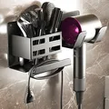 Produktbild: NCKIHRKK Föhnhalter Wand Ohne Bohren, Aluminium Föhn Halterung mit 2 Fächern Aufbewahrung und Kabelhaler, Fönhalter Ohne Bohren für Haartrocknergriffe bis zu 5cm, Schwarz