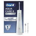 Produktbild: Oral-B AquaCare 6 Kabellose Munddusche — 3 Ersatzdüsen, Zahnzwischenraumreiniger, Sanfte Zahnreinigung & Gesünderes Zahnfleisch, Oxyjet-Technologie, 3 Modi für Zahnpflege — Weiß/Grau