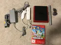 Produktbild: Nintendo Wii Mini Rot Konsole mit New Super Mario Bros.