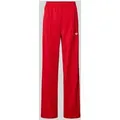 Produktbild: adidas Originals Trainingshose mit elastischem Bund und Logo Modell 'FIREBIRD' in Rot, Größe XS