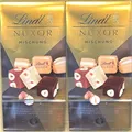 Produktbild: Lindt NUXOR Gianduja MISCHUNG Beutel Weiss, Feinherb & Milch 2x 103g = 206g