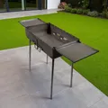Produktbild: GOROCH Tragbarer Schaschlikgrill Transformer mit 2 Klapptischen – Faltbarer Holzkohlegrill für 12 Spieße, aus 3 mm Stahl, klappbar als Koffer mit Griff, ideal für Garten, Picknick & Camping