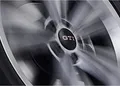 Produktbild: Volkswagen 000071213E Nabenkappen dynamisch Radnabenkappen (4 Stück), mit GTI Logo, schwarz/rot