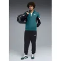 Produktbild: PUMA Trainingsanzug ESS BLOCK POLY SUIT (2-tlg), für entspannte Tage, für vielseitige Aktivitäten grün M (48/50)