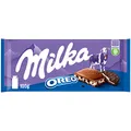 Produktbild: Milka Oreo – Alpenmilch-Schokolade gefüllt mit knusprigen Oreo-Keks-Stückchen und feiner Vanillecrème – 100g