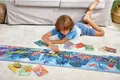 Produktbild: Hape Dinosaurier Puzzle 1,5 Meter Glow in the Dark Karton