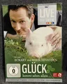 Produktbild: DVD Glück kommt selten allein: Die Live Show ( im Pappschuber )