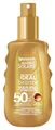 Produktbild: Garnier UV-Sonnenschutzspray für eine strahlende Bräune, Sehr hoher Sonnenschutz mit LSF 50, Wasserfest, Ambre Solaire Ideal Bronze Milk-in-Spray, 1 x 150 ml