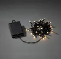 Produktbild: Konstsmide LED Lichterkette, mit an/aus Schalter und 6h Timer, mit 8 Funktionen und Memoryfunktion, gefrostet, 40 warm weiße Dioden, batteriebetrieben, Außen (IP44), schwarzes Kabel, Batterie: 4 x AA 1,5V (exkl.) - 3724-130
