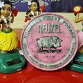 Produktbild: Reuzel Pomade Pink Ölbasiert starker Halt 113ml.        100ml=17,65E
