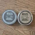 Produktbild: Je 1 Dose Reuzel Pomade extreme Hold+concrete Hold  100gr=16,77E: