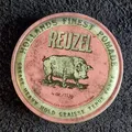 Produktbild: Reuzel Pomade Pink Ölbasiert starker Halt 113ml.        100ml=17,65E