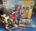 Produktbild: LEGO CREATOR: Stadthaus mit Zoohandlung & Café (31097)