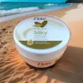 Produktbild: DOVE SILKY PAMPERING BODY CREAM - 300ML