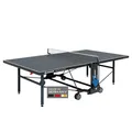Produktbild: Schildkröt Tischtennisplatte ProTec Outdoor, wetterfester Kompakttisch, 6mm Melaminharzplatte, trendiges matt-schwarzes Design, klappbar und durch lenkbare Räder leicht fahrbar