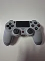 Produktbild: Sony PS4 DualShock 4 Controller 20th Anniversary Edition Grau – Sehr gut