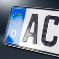 Produktbild: 1 CARBON Kfz Kennzeichen | 420x110 mm | OFFIZIELL amtliches Nummernschild | DHL