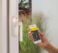 Produktbild: Schellenberg Smart Home Fenstergriff mit Alarm und Funk in Silber