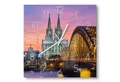 Produktbild: DEQORI Wanduhr 'Kölner Wahrzeichen abends' (Glas Glasuhr modern Wand Uhr Design Küchenuhr)