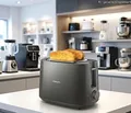 Produktbild: Philips HD2581/10 Toaster 8 Stufen Auftauen Aufwärmen Brötchenaufsatz grau 830W