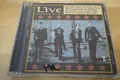 Produktbild: LIVE v NM/EX (CD Album, Alternative, Radioactive)