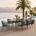 Produktbild: IDIMEX Gartenmöbel Set Sunny mit ausziehbarem Esstisch und 8 Stühlen, Esstisch Gestell aus Alu in schwarz, Seilbespannung der Stühle in grau, Essgruppe inkl. Sitzkissen, Terassenmöbel