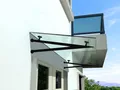 Produktbild: BuyLando (V) 190x90 cm Klarglas Glasvordach inkl. Edelstahlhalter in Schwarz