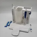 Produktbild: Oral-B Oral Health Center Munddusche. 1× Deckel abgebrochen, 1× Düse fehlt.