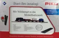 Produktbild: PIKO 57113 H0 DC BR98, Start-Set Güterzug, DB mit Bettung