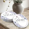Produktbild: 50 Bierdeckel rund 'Schön, DASS du da bist' – floral Schmetterling fliederblau – Vintage Tischdeko & Gastgeschenk Hochzeit – stilvoller Untersetzer – 50 Stück – Funke & Brand